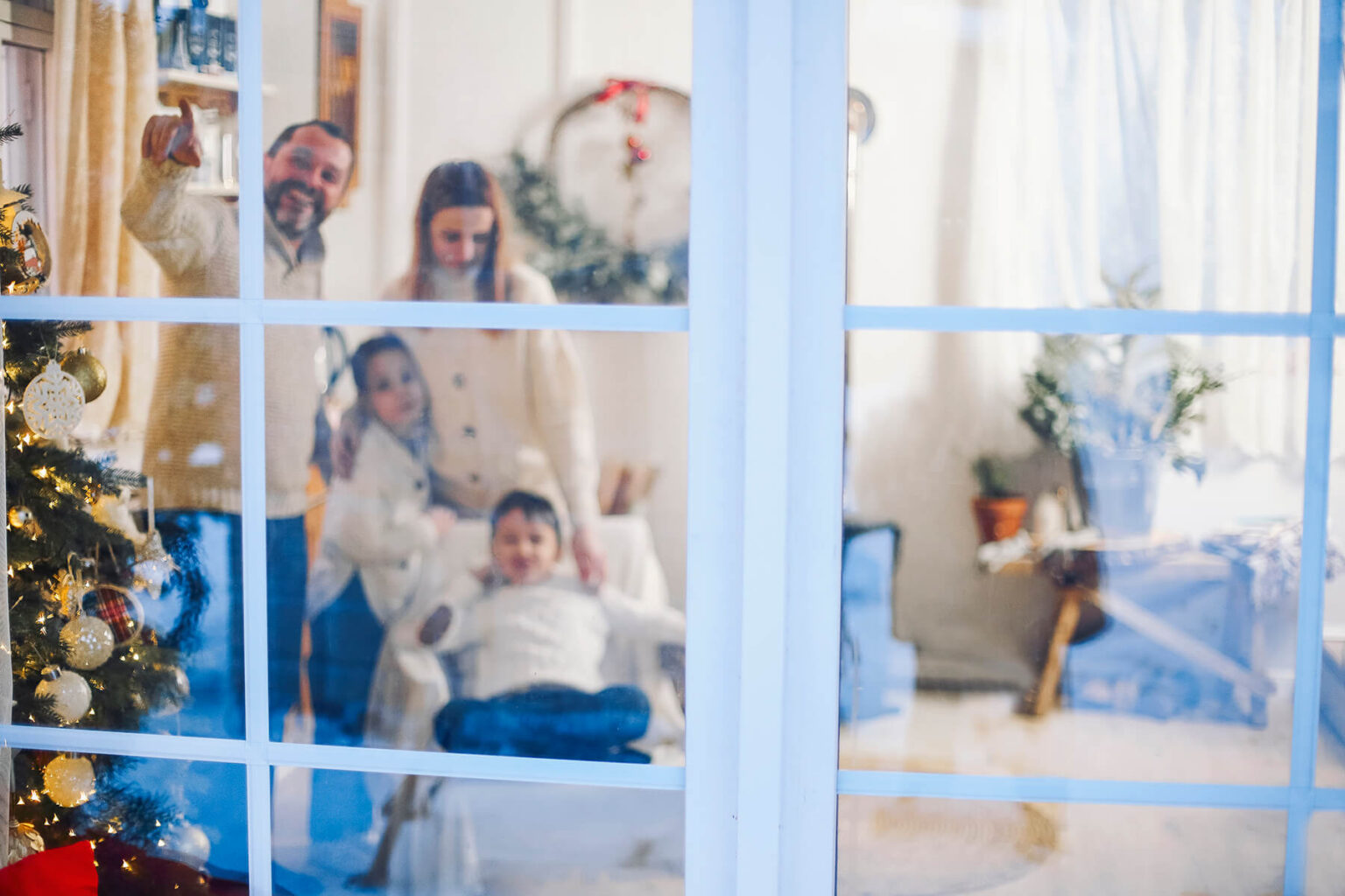 portrait-woman-looking-through-window